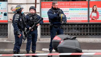 Oolice officers cordon off the scene. AFP