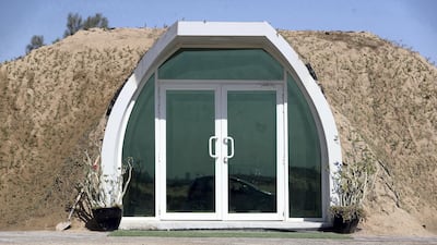 The liveable domes are covered in soil so Bermuda grass or creeping vines can grow to protect a polycarbonate structure from the elements.
