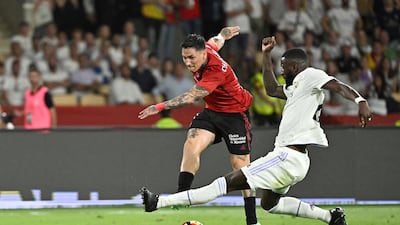 Osasuna forward Ezequiel Avila has a shot blockeed by Real Madrid defender Antonio Rudiger. AFP