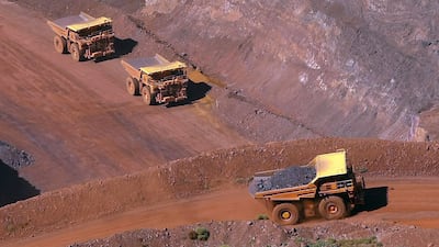 A tipper truck climbs out of a Rio Tinto iron ore mine at Tom Price, about 1,300km north of Perth, Australia. Rio Tinto announced the resignation of its chief executive and two other top officers on Friday over the mining giant's destruction of an Aboriginal site. Tim Wimborne / Reuters