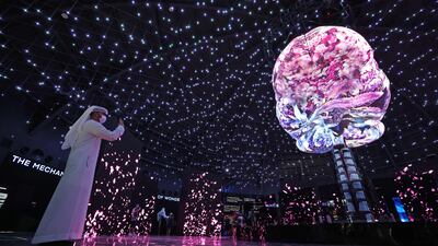Visitors take pictures inside the Russia pavilion. AFP