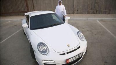 Khaled Al Qubaisi uses his Porsche 911 GT3 on a daily basis as well as on tracks but he intends to keep it in good shape for when his oldest son is ready to drive. Razan Alzayani / The National