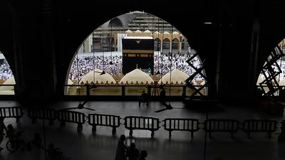 Pilgrims circumambulate around the Kaaba during Umrah in Mecca. AP Photo