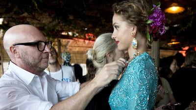 Domenico Dolce puts on a few final touches. Courtesy Jason Lloyd Evans / Greg Kasler