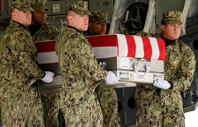 A US Navy carry team carry the body of Scott Wirtz, one of four Americans killed during a suicide bombing in the northern Syrian city of Manbij. EPA / Scott Serio