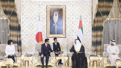 Japanese Prime Minister Shinzo Abe is welcomed by Dr Sultan Al Jaber, Minister of State and Adnoc Group chief executive, upon his arrival to the UAE on Sunday. Wam