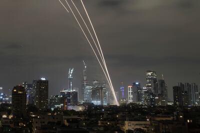 The Iron Dome air defence system fires to intercept missiles during an Iranian attack over Tel Aviv. AP