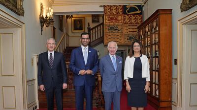 COP29 President-Designate Mukhtar Babayev, COP28 President Sultan Al Jaber, Britain's King Charles and Brazil's National Secretary for Climate Change Ana Toni pose for a group photo as they attend a COP Presidencies Troika meeting at Clarence House, in London, Britain July 26, 2024. Yui Mok / Pool via REUTERS