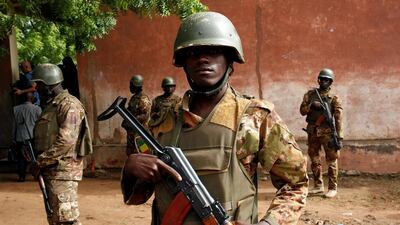 Soldiers provide security as President of Mali Ibrahim Boubacar Keita casts his vote in Bamako, July, 29 2018. Reuters