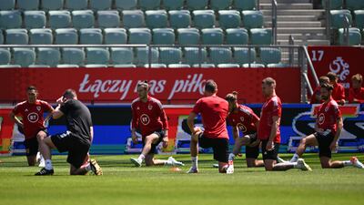 The Wales football squad warm up during a training session in Wroclaw, Poland, on May 31, 2022, ahead of for their Uefa Nations League clash with Poland on Wednesday, June 1. EPA