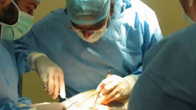 An operation in a UAE hospital. More people will now have access to basic health insurance.