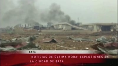 Smoke rises from destroyed structures following explosions at a military base, according to local media, in Bata, Equatorial Guinea. Reuters