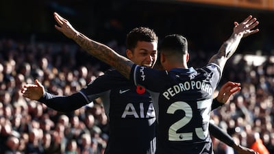 Tottenham Hotspur's Brennan Johnson celebrates with Pedro Porro after scoring the first goal. AFP