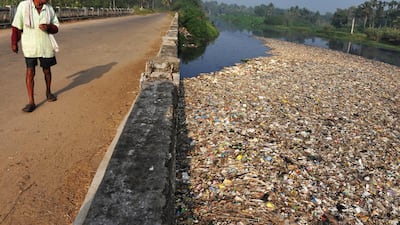 A villager in looks over a heavily polluted river in a village 50 kms south of Bangalore, India. Developing countries were among the worst affected by antibiotics in water - largely due to frequent spills and poor controls. AFP