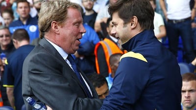 Tottenham Hotspur manager Mauricio Pochettino, right, greets QPR manager Harry Redknapp before their match on Sunday. Eddie Keogh / Reuters / August 24, 2014