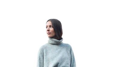 Get that warm fuzzy feeling: a street-style sweater being shown off at this year’s Paris Fashion Week. Vanni Bassetti / Getty Images