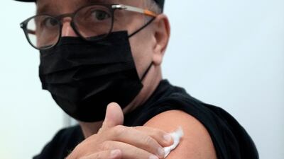 Vitaly Pavlov pictured after his Covid-19 jab.