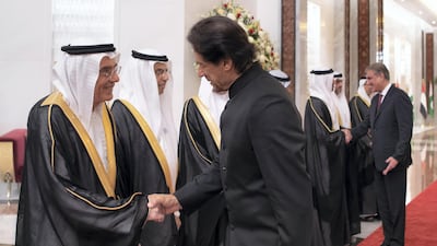Zaki Nusseibeh, Minister of State, greets Imran Khan. Saeed Al Neyadi / Crown Prince Court - Abu Dhabi