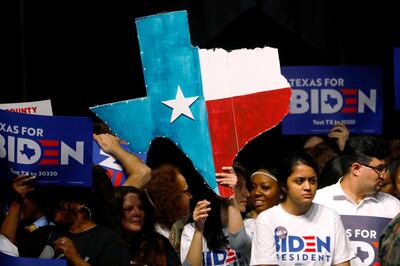 People wait for the start of a campaign event for Democratic 2020 US presidential candidate former Vice President Joe Biden in Dallas, Texas. Reuters