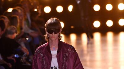 A model in a statement t-shirt and bomber jacket. AFP