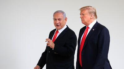 In this March 25, 2019, file photo, President Donald Trump and visiting Israeli Prime Minister Benjamin Netanyahu walk along the Colonnade of the White House in Washington. AP