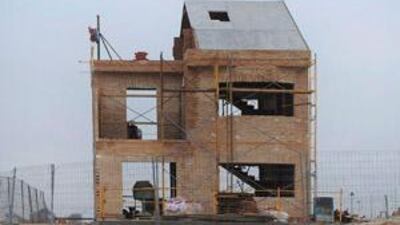 Ambitious construction plans were launched all over the world during the property boom, but once the bubble burst the shells of cancelled buildings were left to lie fallow, as at this housing development in Madrid.