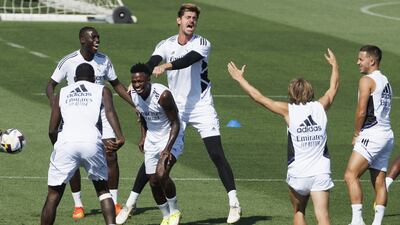 Real Madrid defender Ferlan Mendy, Vinicius Jr and Thibaut Courtois with teammates during the training at Valdebebas Sports City in Madrid. EPA