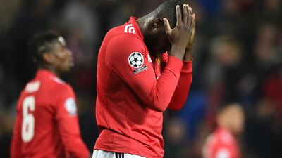 Manchester United's Belgian striker Romelu Lukaku reacts after missing a shot during a last 16 second leg Uefa Champions League match against Sevilla at Old Trafford. Oli Scarff / AFP