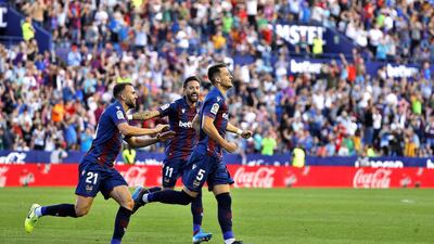 Levante midfielder Nemanja Radoja, right, after scoring against Barcelona in Valencia. EPA