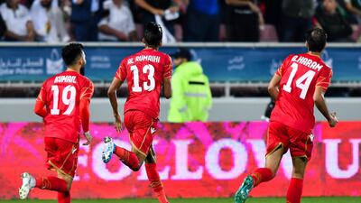 Mohamed Al Rumaihi, centre, scored the only goal of the game. EPA