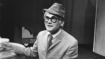 Hockney at the Royal Court Theatre in London, UK, July 1966, on the set he designed for the play Ubu Roi. Getty Images