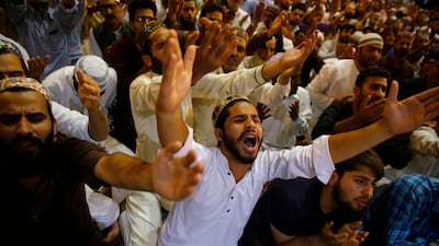 Muslims raise their hands as they pray during special night prayers on Laylat Al Qadr at Jamia Masjid or Grand Mosque in Srinagar, the summer capital of Indian Kashmir, early 12 June 2018. Farooq Khan / EPA
