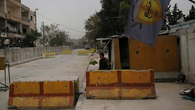 The entrance to the headquarters of the Manbij Military Council, the Kurdish-led militia group that holds Manbij town in northern Syria. Hussein Malla / AP Photo