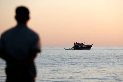 A view shows a wooden boat carrying Rohingya refugees adrift in the Labuhan Haji sea area, South Aceh, in Indonesia, on October 22. More than 120 million people are displaced ever year, globally. EPA