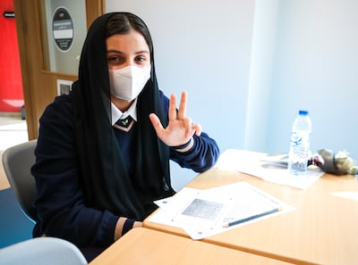 A pupil from Al Mamoura Academy in Abu Dhabi on their first day of class after summer break. Victor Besa / The National