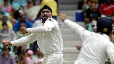 Harbhajan Singh celebrates the dismissal of Hashim Amla, who top-scored with 33, at Durban.
