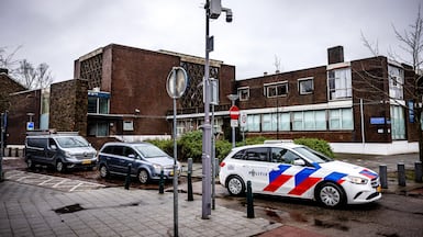 A police car stationed outside a synagogue targeted in an arson attack in Rotterdam. EPA