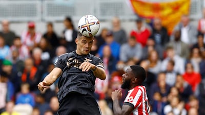 Arsenal's Granit Xhaka competes with Brentford's Josh Dasilva. Reuters