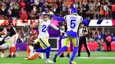 Los Angeles Rams' Taylor Rapp, left, and Jalen Ramsey celebrate after winning Super Bowl LVI. AFP