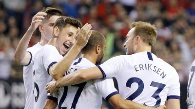 Lucas Moura, centre, is congratulated on his goal for Tottenham. Reuters
