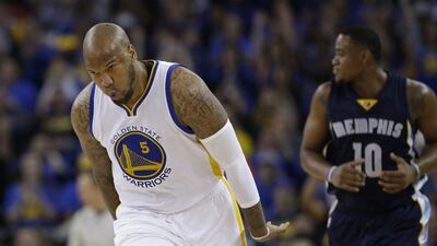 Golden State Warriors’ Marreese Speights (5) reacts after scoring against the Memphis Grizzlies during the first half of an NBA basketball game Wednesday, April 13, 2016, in Oakland, California. (AP Photo/Marcio Jose Sanchez)