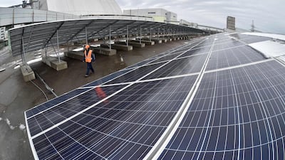 Photovoltaic panels on a power plant. The long-term benefits of renewable energy for households and industrial consumers are cheaper energy and the flexibility to change providers. Photo: AFP