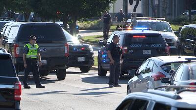 A video grab shows police at the scene. Greg Miller / EPA