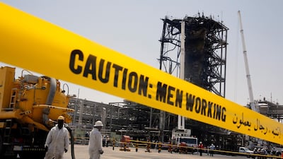 Workers at Aramco's oil processing facility in Khurais, near Dammam work to restore oil production after Iranian missile attacks in September. AP Photo