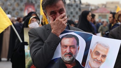 A man at the funeral in Tehran mourns Mousavi's death. AFP