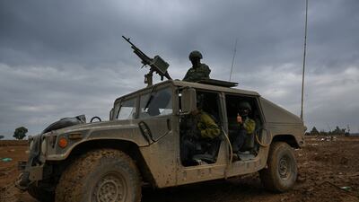 Israeli soldiers near the Gaza border in southern Israel on Thursday. Getty Images