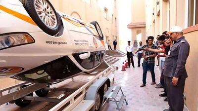 Provided photo of the roll-over experience, a receptive simulator helps students at Indian university, Bits Pilani realise the advantages of wearing seatbelts. A road-safety awareness campaign kicked off on Sunday to promote good driving habits among university students. Courtesy of Ciel Marketing and Events