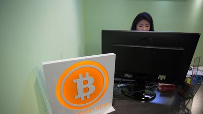 A Bitcoin sign is displayed in the lobby of the ANX office headquarters in Hong Kong, China. Jerome Favre/EPA