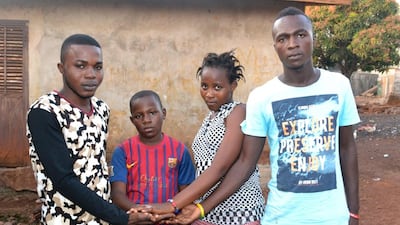 Orphaned children (from left) Leno Emmanuel, Leno Ousmane Tamba, Leno Hawa and Leno Mathias, at their home in Conakry, Guinea on January 12, 2016. They lost both parents to Ebola within one week in October 2014, the year the epidemic broke out. Cellou Binani/AFP