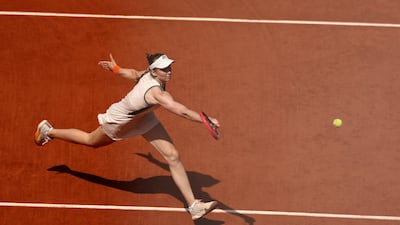 Elena Rybakina of Kazakhstan stretches for a forehand against Elina Svitolina. Getty Images